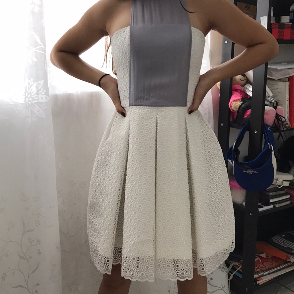 White hand tailored dress.